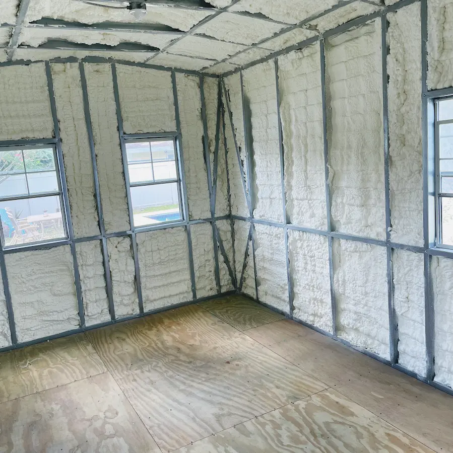 Closed-cell spray foam insulation applied to wall cavities in a residential project in Greeley